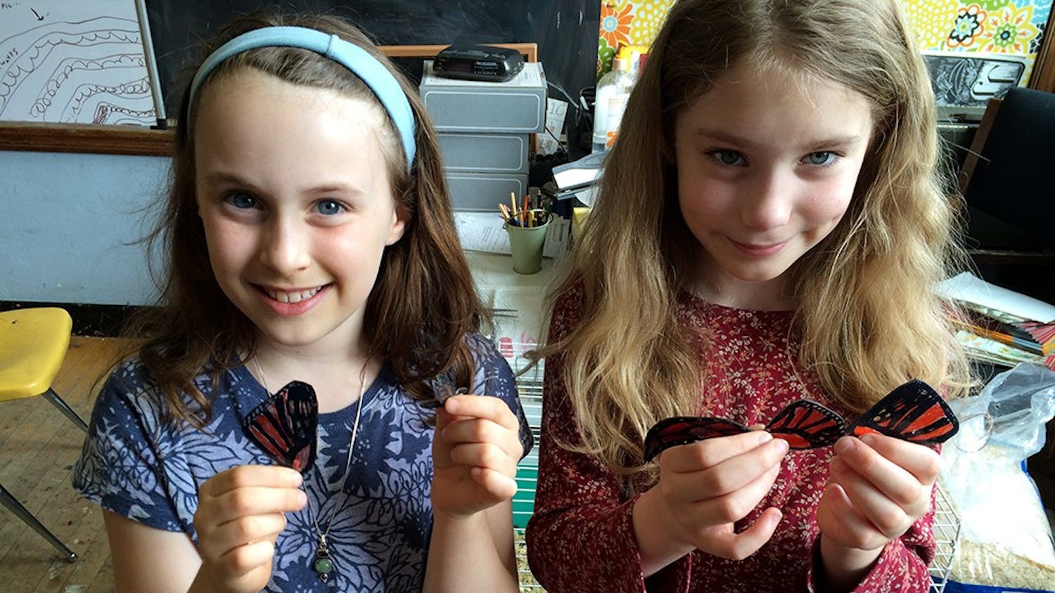 Isobel Casey (left) and Adele Novak made butterflies to be displayed at the "Save the Monarchs" exhibit in Indianapolis. 
