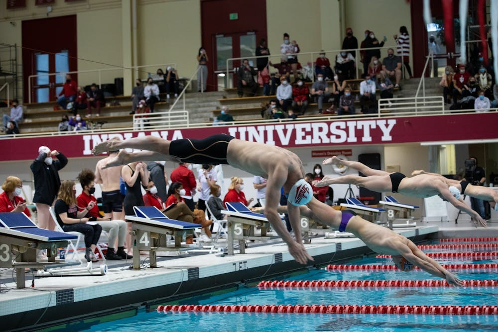 <p>Freshman Jasper Davis jumps off the block to swim in the men&#x27;s 200-yard free race on Jan. 28, 2022, at the Counsilman Billingsley Aquatic Center. Indiana swim and dive concluded the regular season with 14 Big Ten weekly awards.</p>