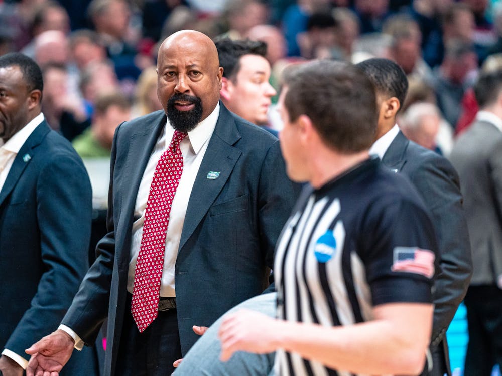 Indiana head coach Mike Woodson exchanges words with a referee Mar. 17, 2022, at the Moda Center in Portland, Oregon. IU men&#x27;s basketball made two new hires Monday: Jordan Hulls as Team and Recruiting Coordinator and Steven Surface as Director of Basketball Operations. 