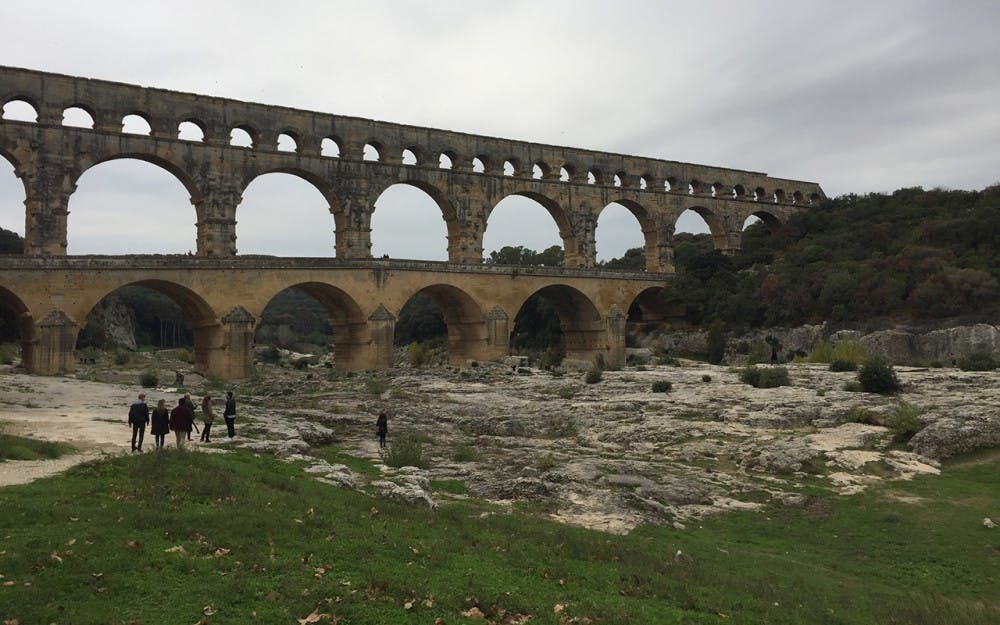 Tourists explore the Pont du Gard, an ancient Roman aqueduct in southern France over the Gardon river. Rachel Rosenstock visited the Pont du Gard as part of her ancient history tour.