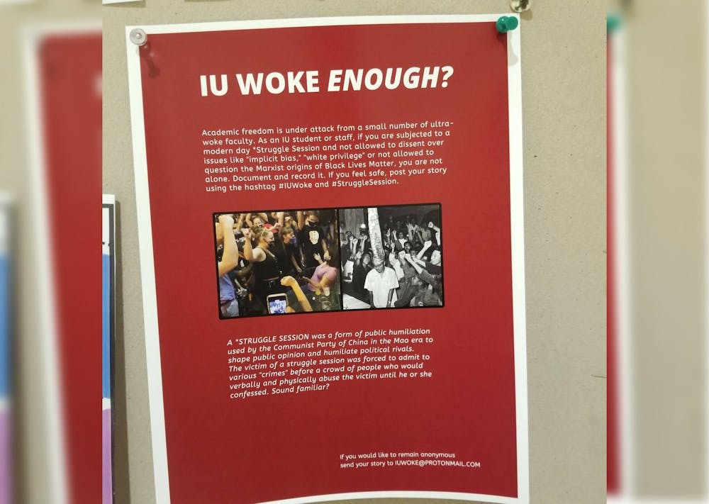 一个写着“IU醒得够多了?”挂在赫尔曼·B·威尔斯图书馆< / p >
