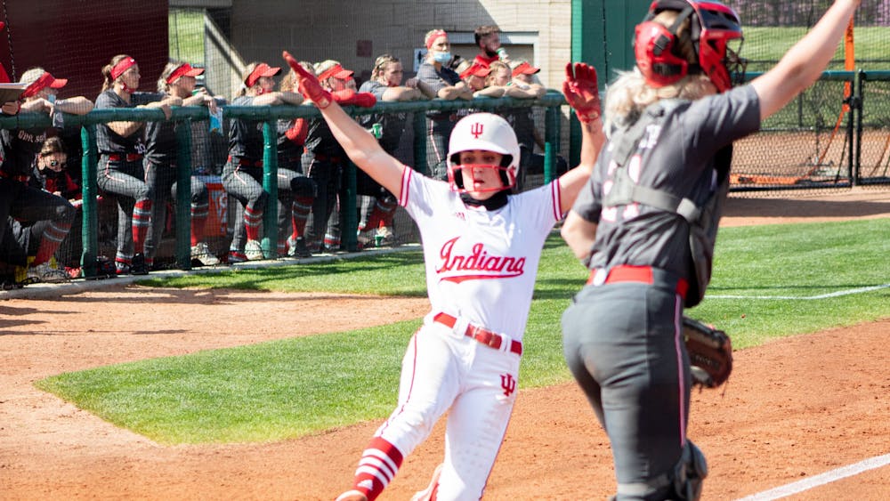 Senior Infielder Grayson Radcliffe slides home against Ohio State on April 16. IU softball swept Penn State this past weekend. 