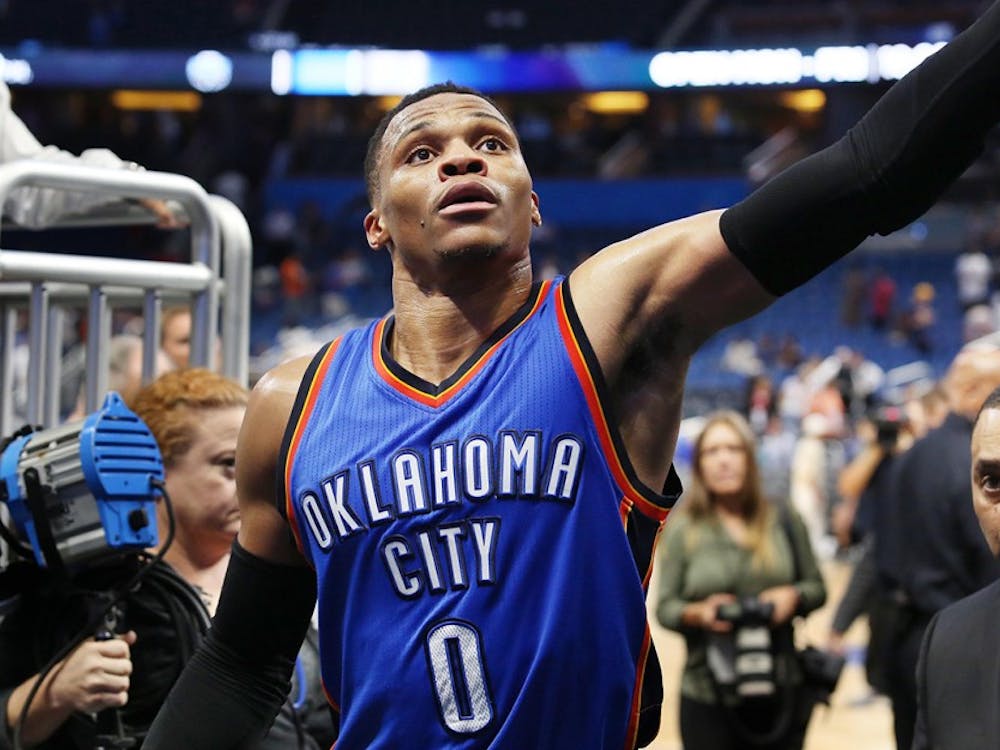 The Oklahoma City Thunder&apos;s Russell Westbrook reaches out to fans after a 114-106 win in overtime against the Orlando Magic at the Amway Center in Orlando, Fla., on Wednesday, March 29, 2017. (Stephen M. Dowell/Orlando Sentinel/TNS)