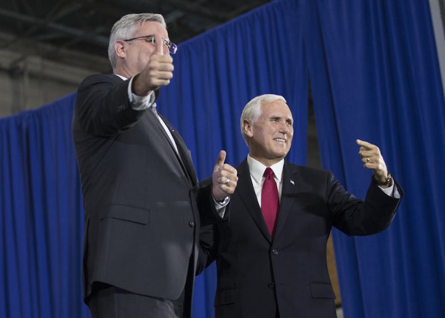 Gov. Eric Holcomb introduces Vice President Mike Pence at the Wylam Center of Flagship East on Friday.&nbsp;
