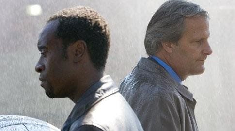 Don Cheadle and Jeff Daniels are clearly upset about wearing the same leather jacket.