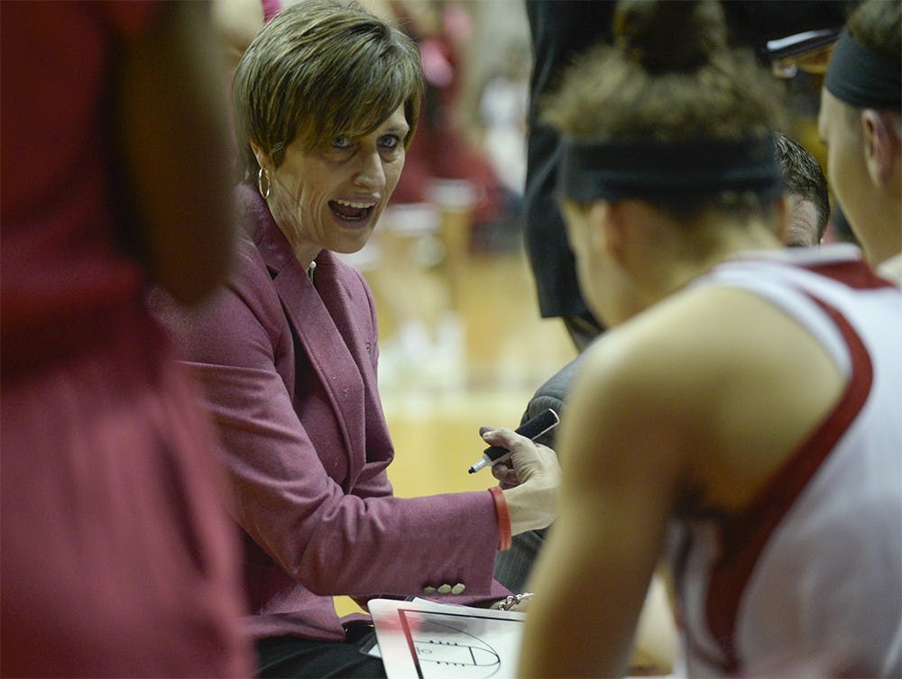Head coach Teri Moren talks to her players during a timeout in IU's game against Illinois on Wednesday at Assembly Hall.