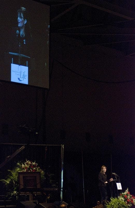 Alaska governor Sarah Palin talks to attendees at the Vandenburg County Right to Life dinner Thursday evening in Evansville. Palin advertised her home state's geographic features and discussed issues raised during her vice-presidential run before talking about the importance of the right-to-life movement.