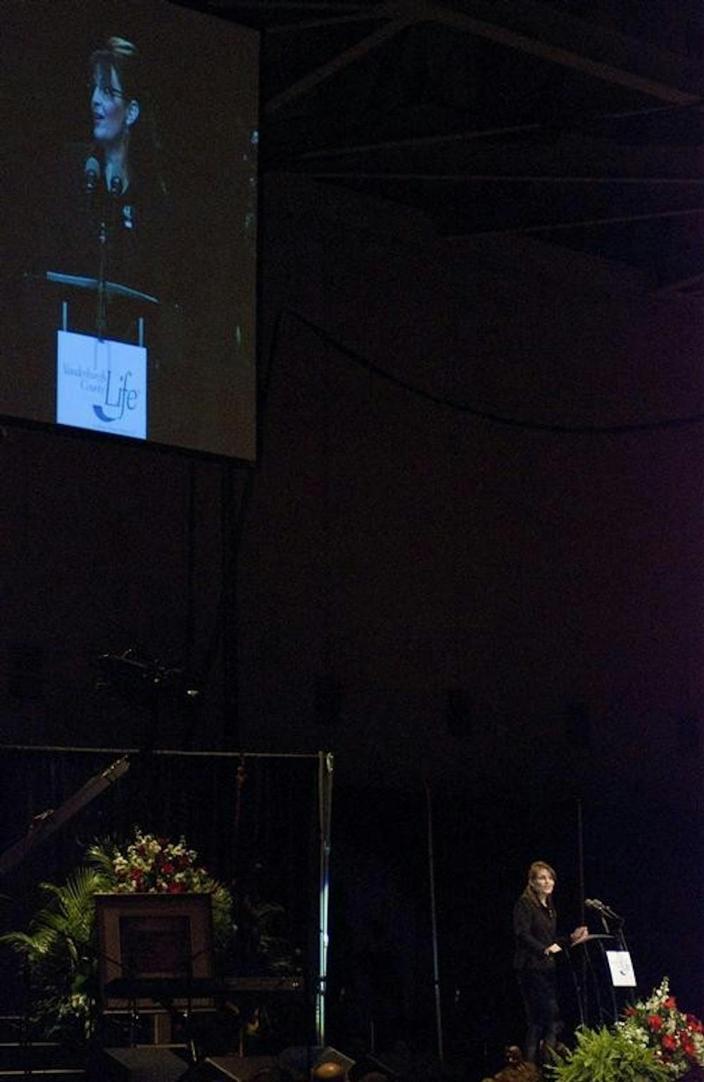 Alaska governor Sarah Palin talks to attendees at the Vandenburg County Right to Life dinner Thursday evening in Evansville. Palin advertised her home state's geographic features and discussed issues raised during her vice-presidential run before talking about the importance of the right-to-life movement.
