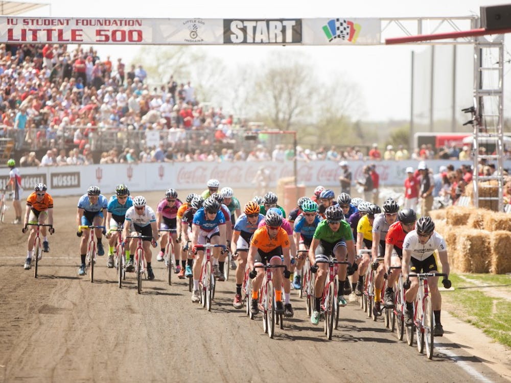 Riders race along the main straightaway during the men's Little 500 on Saturday at Bill Armstrong Stadium
