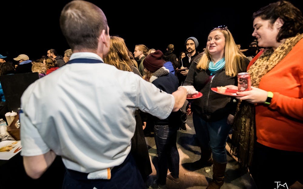 An Indianapolis chef hands out samples to a sold-out crowd of 3,000 at the inaugural Return of the Mac Fest. To give more people a chance to attend, the festival is going on the road with the first stop April 2 in Bloomington.