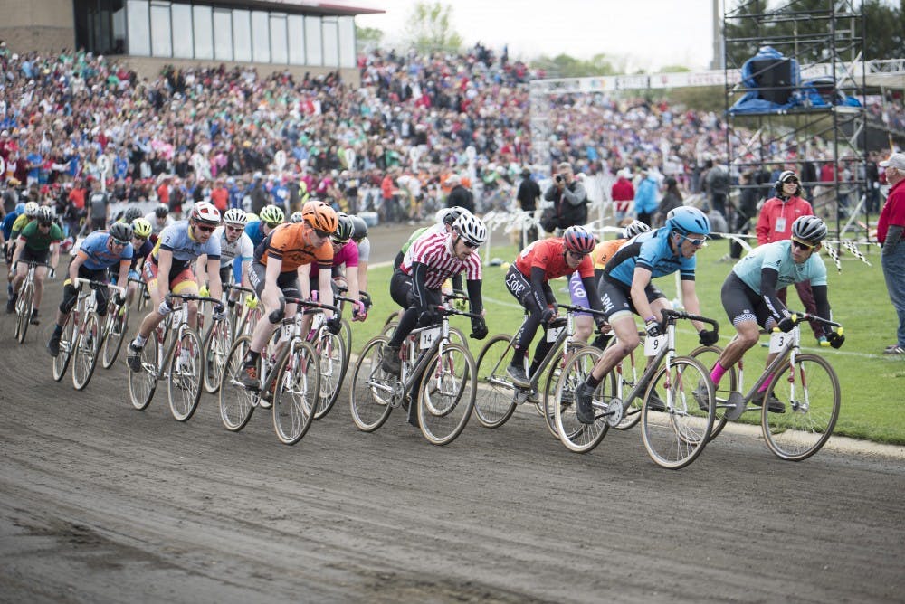 Riders in the pack ride their final laps at the men's race on April 22, 2017. The first race, featuring only men, happened in 1951. 