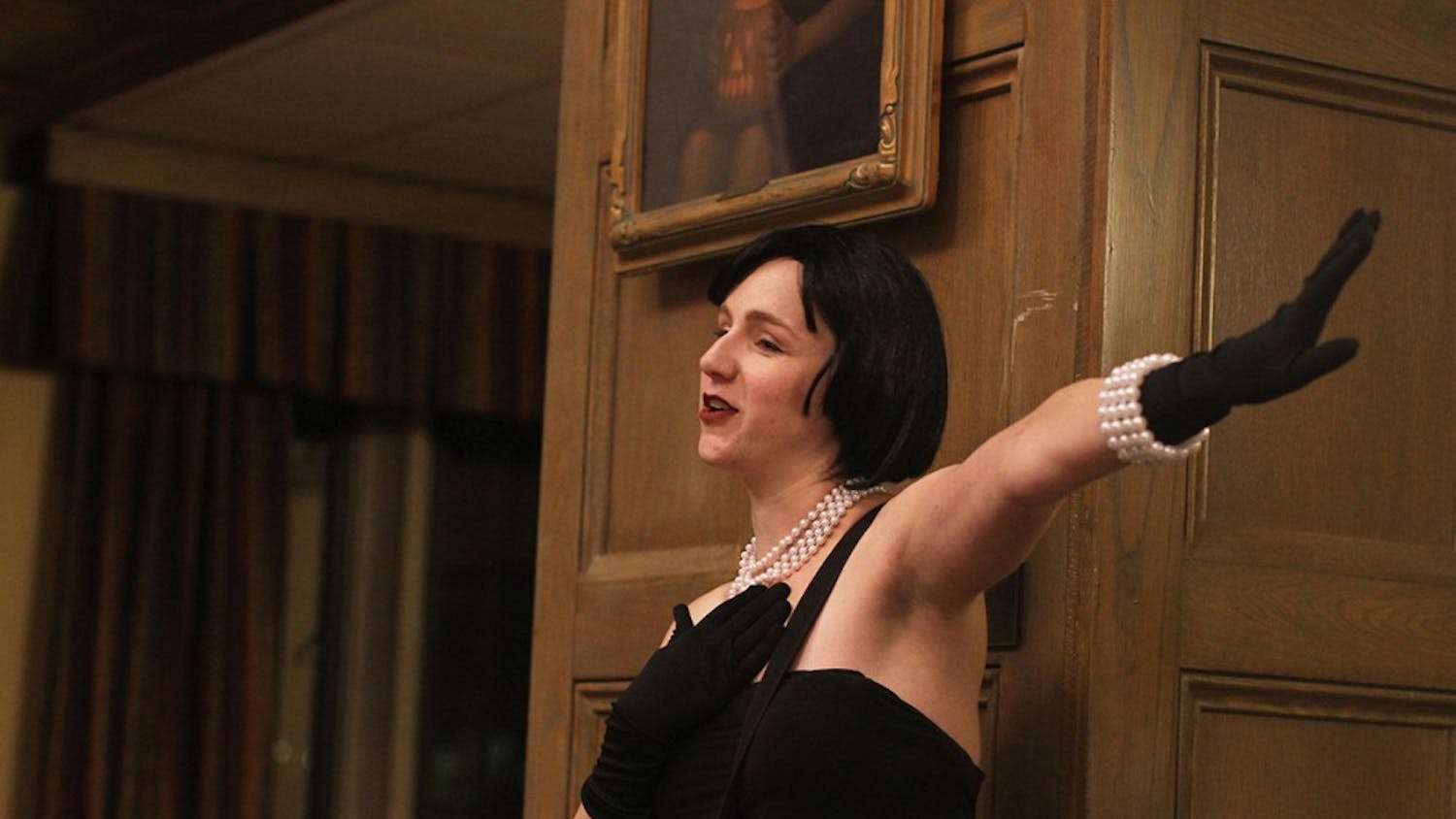 In the Tudor Room, junior Adriane Pontecorvo talked about Jacob, the spirit of the formal dining room at the Ghost Tour Tuesday night. Like any kid, when Jacob is upset, he knocks the chairs over and messes up the room, she said. 