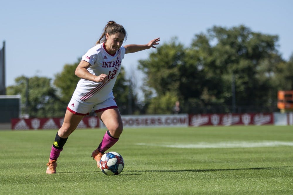 <p>Junior Melanie Forbes attempts to kick the ball toward a teammate closer to the goal Oct. 13 at Bill Armstrong Stadium. IU had a doubleheader of women’s and men’s soccer. </p>