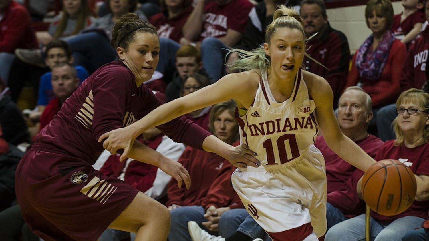 Sophomore guard Taylor Agler dribbles around IUPUI defender Sunday at Assembly Hall. The Hoosiers won 68-55 and will return to Assembly Hall next Wednesday to play Indiana University-Purdue University Fort Wayne (IPFW).