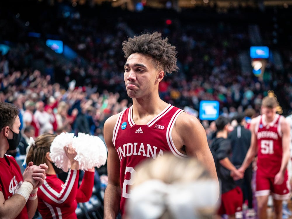 Sophomore forward Trayce Jackson-Davis walks off the court folling the end of the game Mar. 17, 2022, at the Moda Center in Portland, OR. Jackson-Davis declared for the 2022 NBA Draft on his Twitter account Saturday.