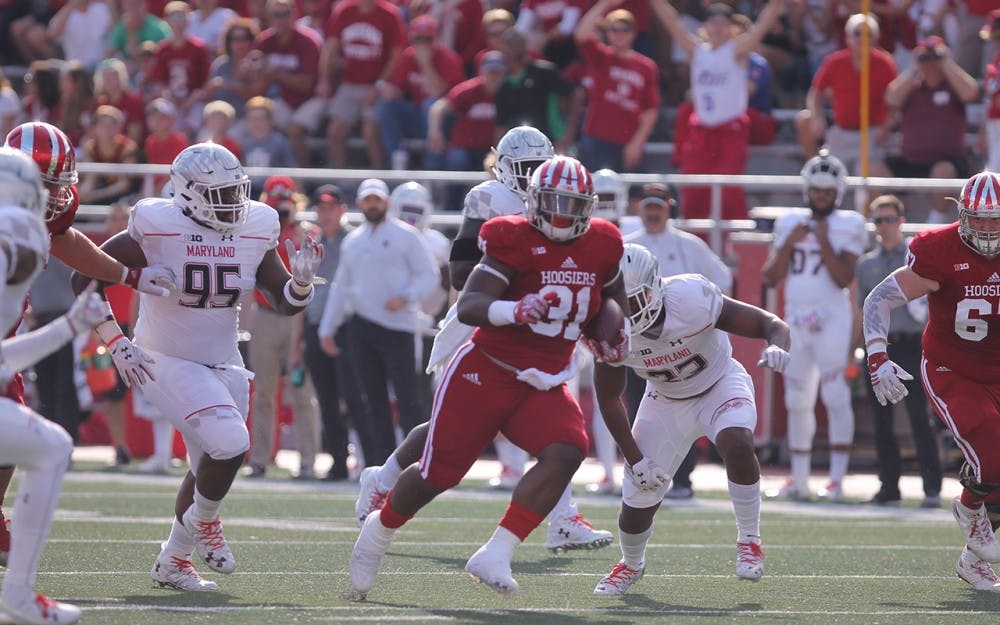 Freshman Tyler Natee runs the ball down the field against Maryland. The Hoosiers defeated the Terrapins 43-36 on Saturday evening at Memorial Stadium.