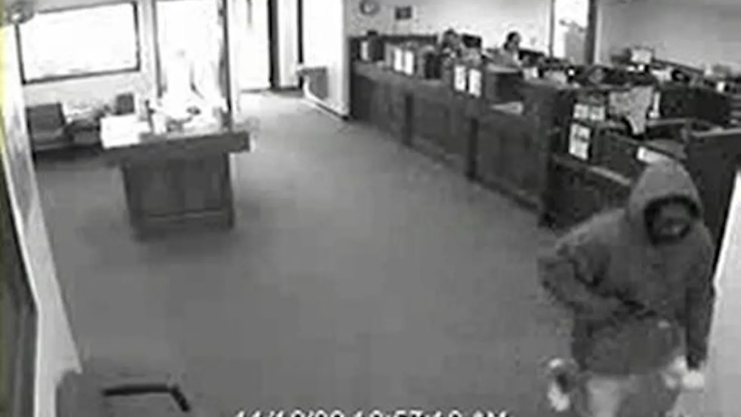 This photo, taken from surveillance footage, shows the suspect of a bank robbery that occurred approximately at 11 AM on Tuesday at People's State Bank at 525 S. Clarizz Boulevard near College Mall.