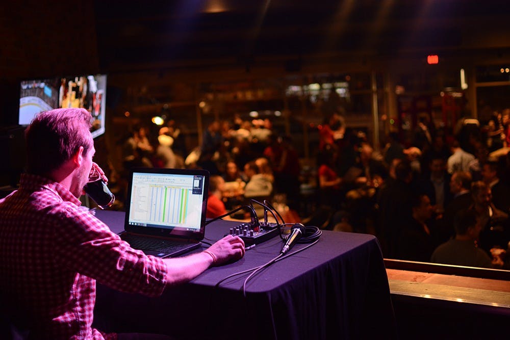 Colin Gregory, takes a break while hosting the live team trivia event at The Tap on Wednesday night. Gregory has been hosting for one and half years. 