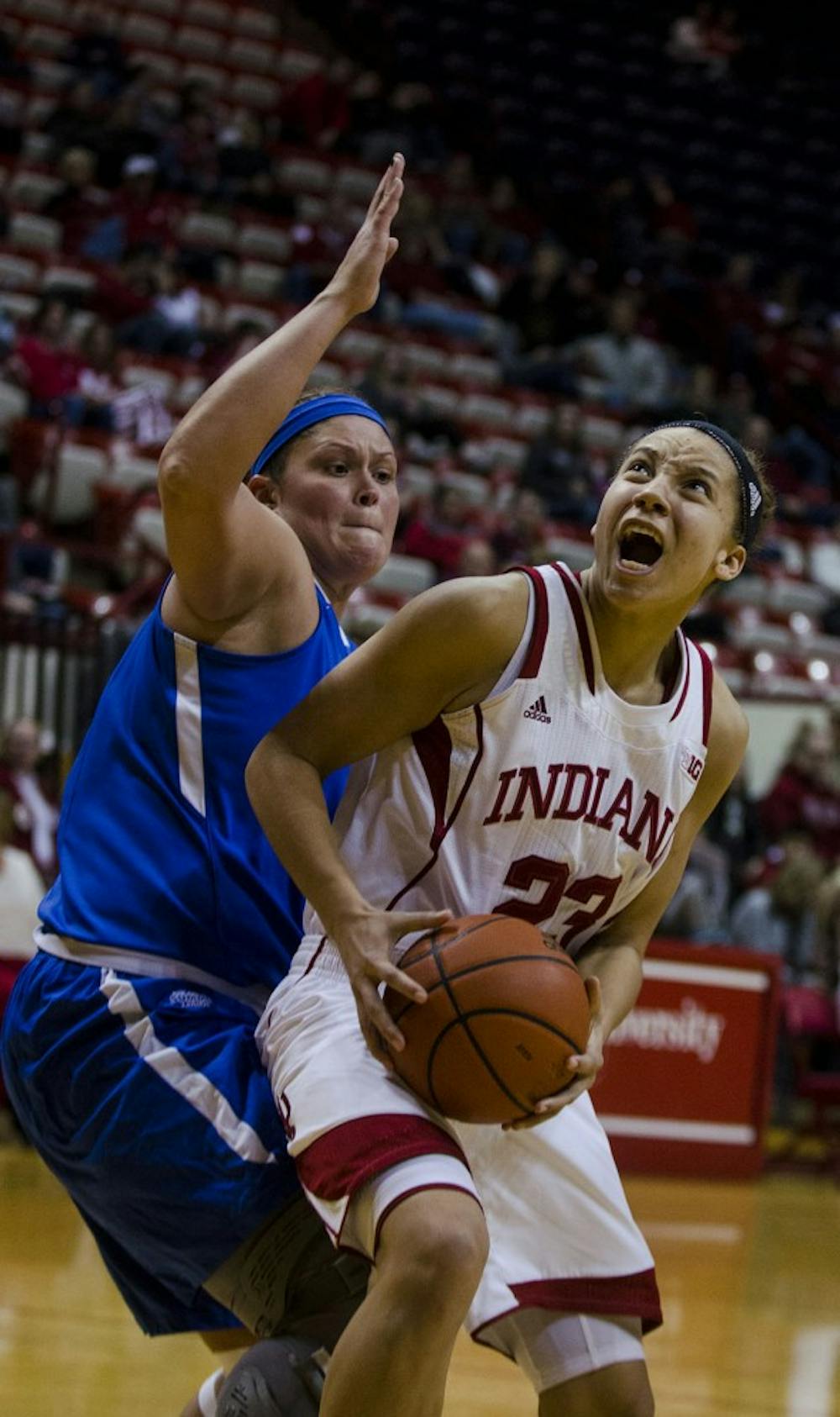 Sophomore guard Alexis Gassion attempts to get free for a shot during the Hoosier's game against the Mastodons on Wednesday at Assembly Hall. The Hoosier won 80-37 and advanced to 8-1.