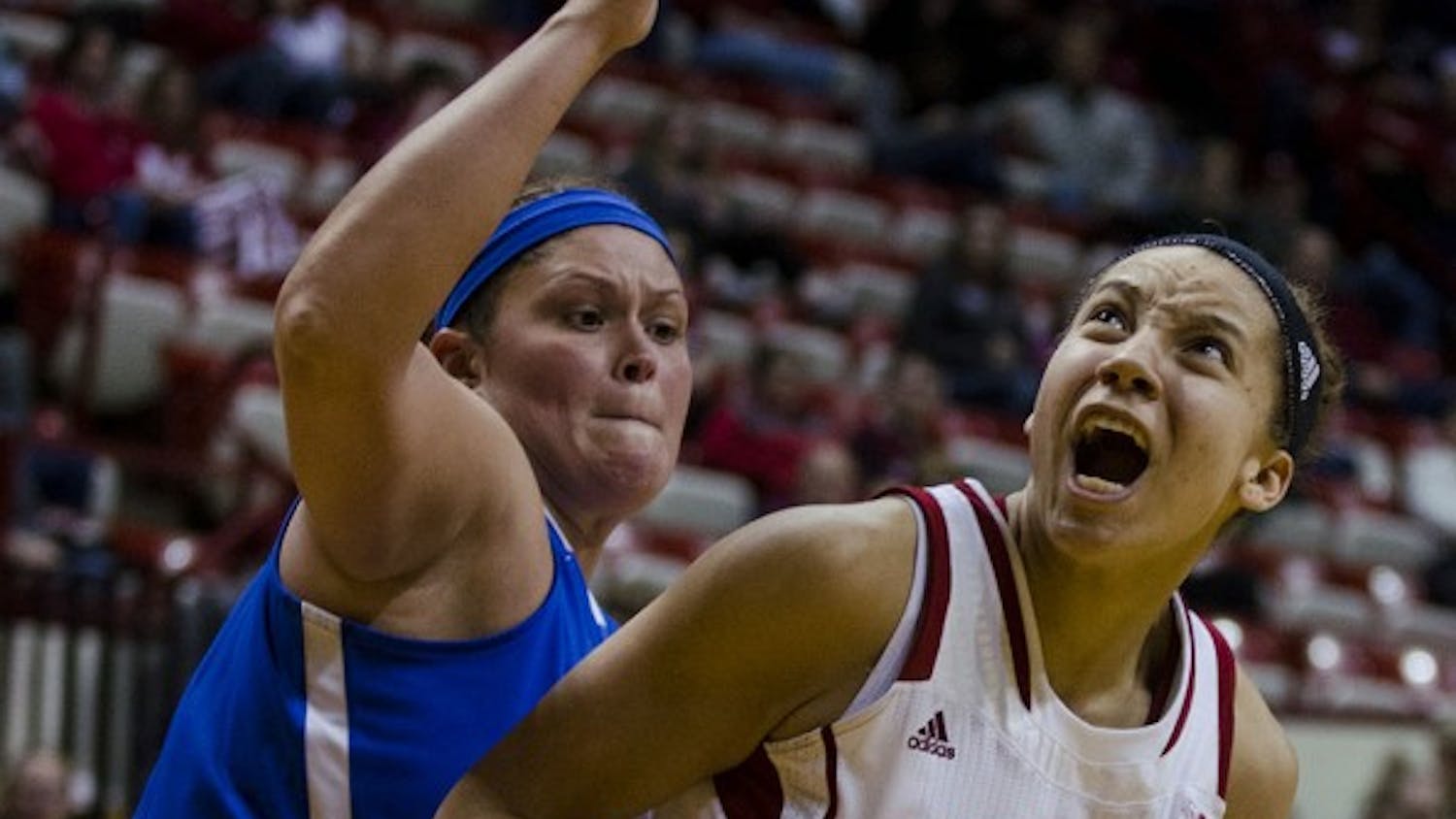 Sophomore guard Alexis Gassion attempts to get free for a shot during the Hoosier's game against the Mastodons on Wednesday at Assembly Hall. The Hoosier won 80-37 and advanced to 8-1.