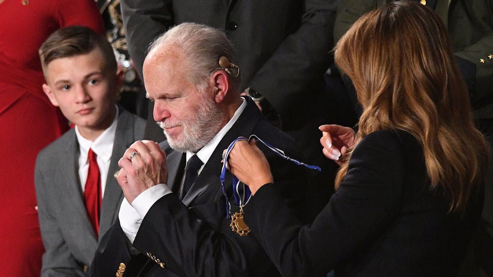Then-First Lady Melania Trump delivers the Medal of Freedom to radio personality Rush Limbaugh on Feb. 4, 2020, at the U.S. Capitol in Washington. Limbaugh, 70, died Wednesday. 