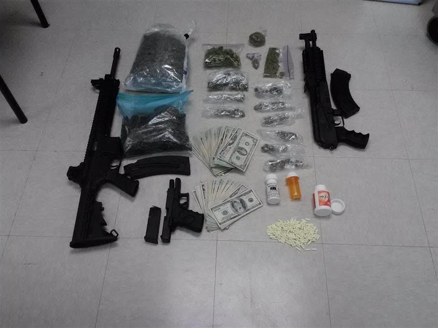 Guns, cash and drugs