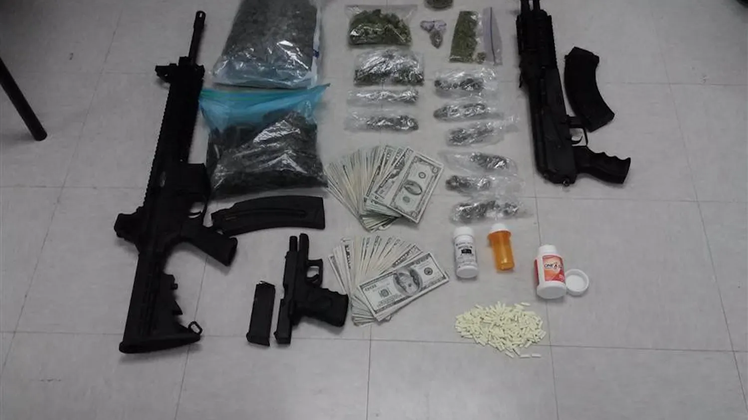 Guns, cash and drugs