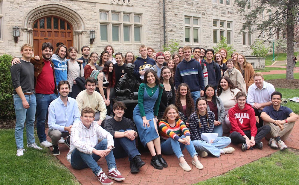 The spring 2023 staff of the Indiana Daily Student gathers for an end-of-the-semester photo outside of Franklin Hall.