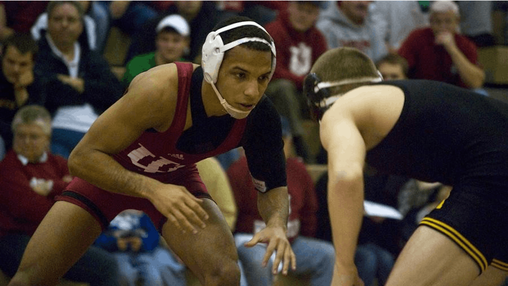 Angel Escobedo, a former NCAA National Champion, prepares himself at the IU vs. Iowa match on February 20, 2009. Escobedo, who won the 125 lbs. weight class, was named the Most Outstanding Wrestler at the 28th Annual Cliff Keen Invitational in Las Vegas.