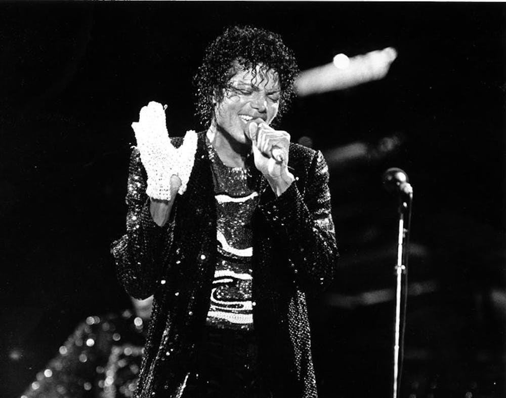 In this July 7, 1984, photo, Michael Jackson wears a white glove during his performance kicking off the "Victory Tour" at Arrowhead Stadium in Kansas City, Mo. Jackson, 50, died Thursday in Los Angeles.