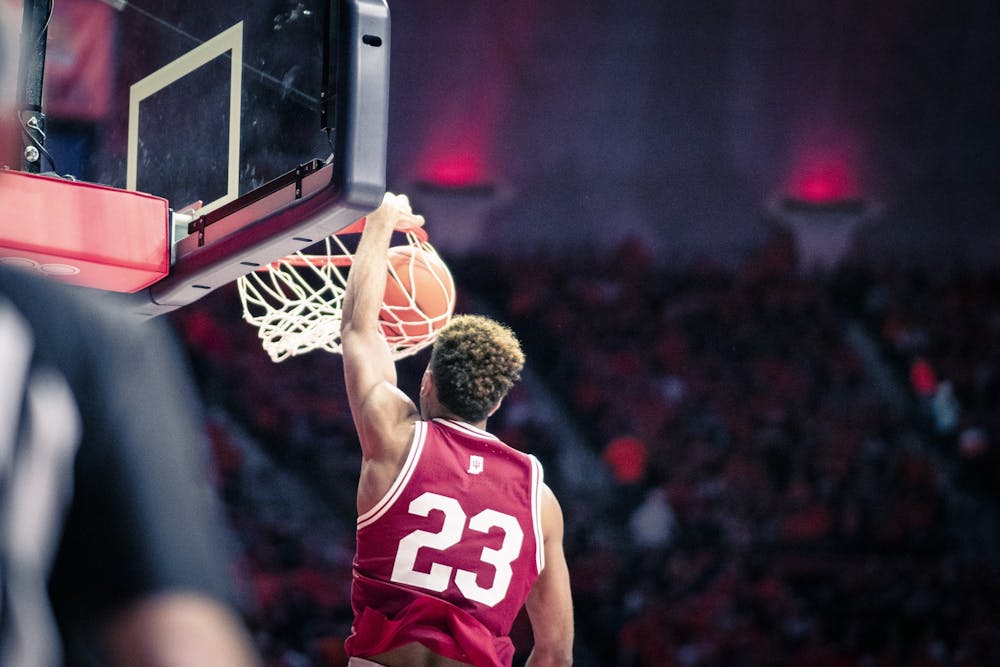 <p>Senior forward Trayce Jackson-Davis dunks Jan. 19, 2023 at Assembly Hall in Champaign, Illinois. Jackson-Davis is averaging career-highs in six different categories.</p>