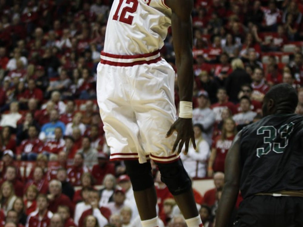 Hanner Mosquera-Perea scores a slam dunk during IU's season-opener against Chicago State on Friday at Assembly Hall. The Hoosiers won 100-72.