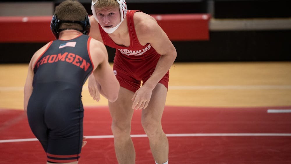 Senior Kyle Luigs sizes up his opponent Feb. 6 at Wilkinson Hall. Luigs won his senior day match against Maryland on Sunday in Wilkinson Hall. 