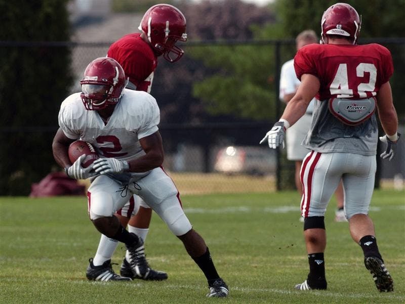 Senior running back Marcus Thigpen runs the ball during a practice drill prior to Saturday’s home opener against Western Kentucky. 