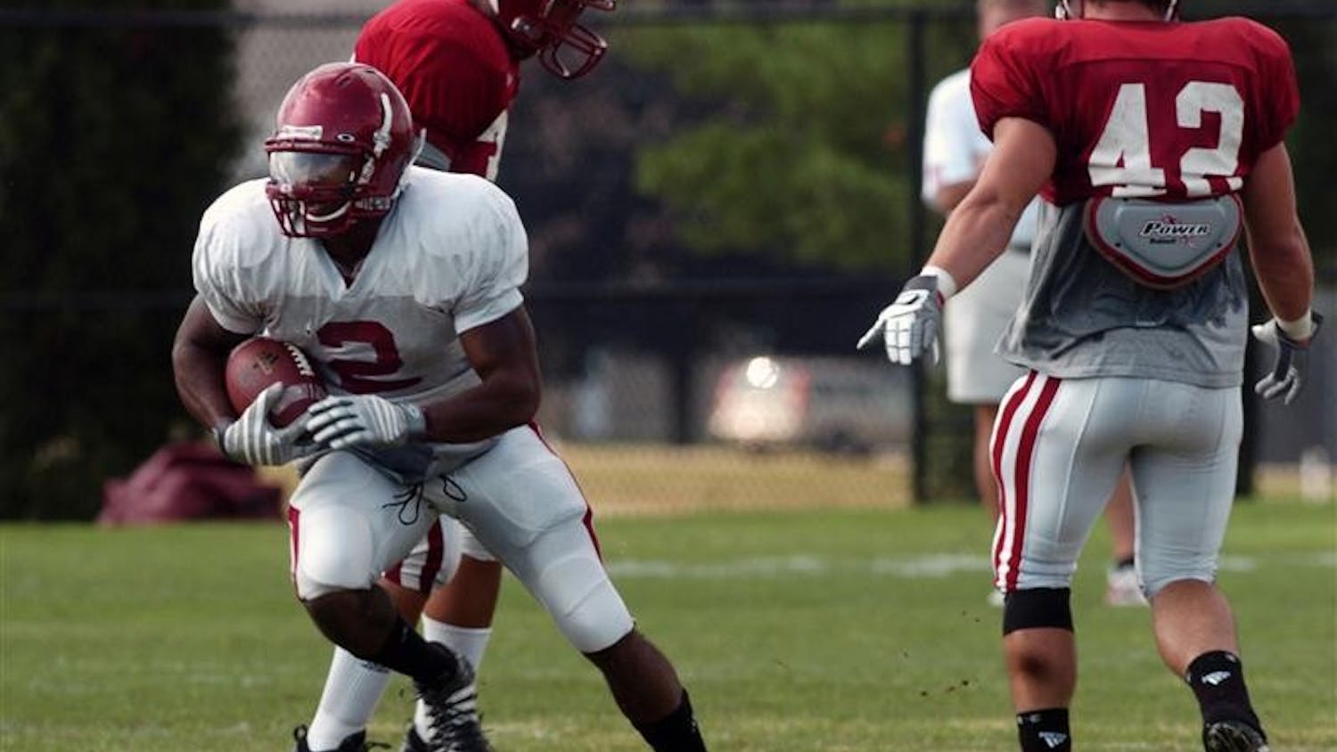 Senior running back Marcus Thigpen runs the ball during a practice drill prior to Saturday’s home opener against Western Kentucky.