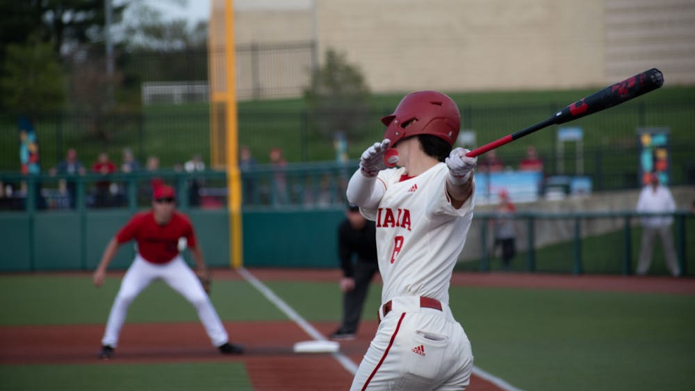 Freshman second baseman Tyler Cerny hits the ball April 18, 2023, against Louiseville at Bart Kaufman Field in Bloomington. Indiana beat Louisville 7-3 Tuesday.