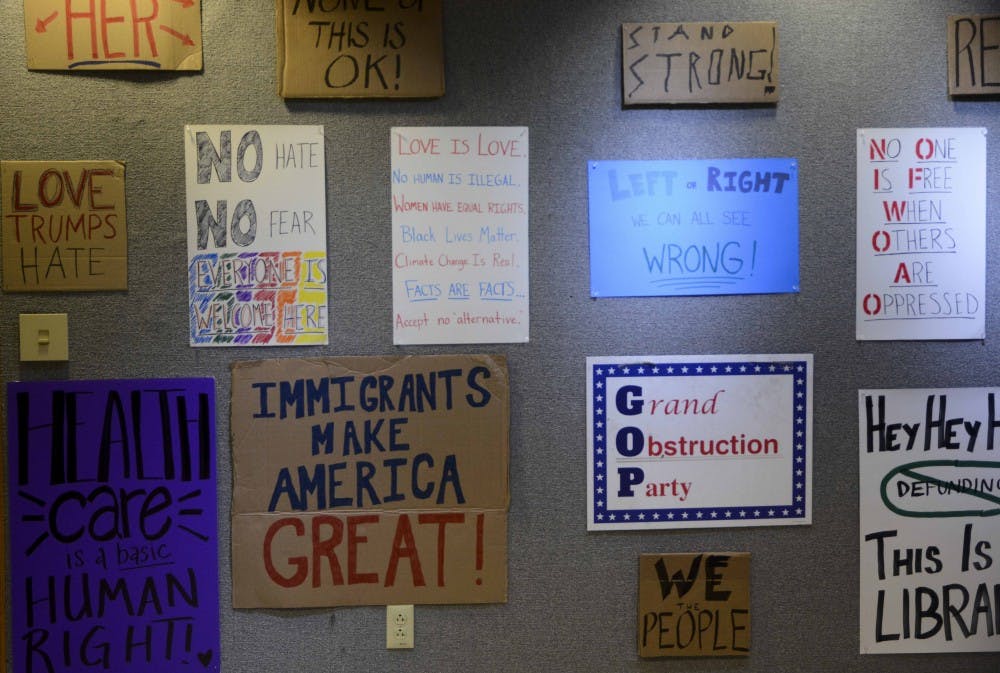 Signs outside of the the Crassroots Conservatives meeting room.