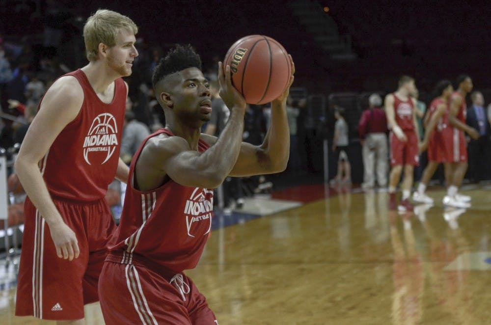 Sophomore guard Rob Johnson shoots a three-point shot during practice on Thursday at the Wells Fargo Center. Indiana will play number one seed North Carolina in the Sweet Sixteen round of the NCAA Tournament tomorrow.