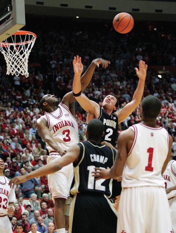 IDS FILE PHOTOIU senior forward D.J. White blocks Purdue's Nemanja Calasan Feb. 19 at Assembly Hall. 