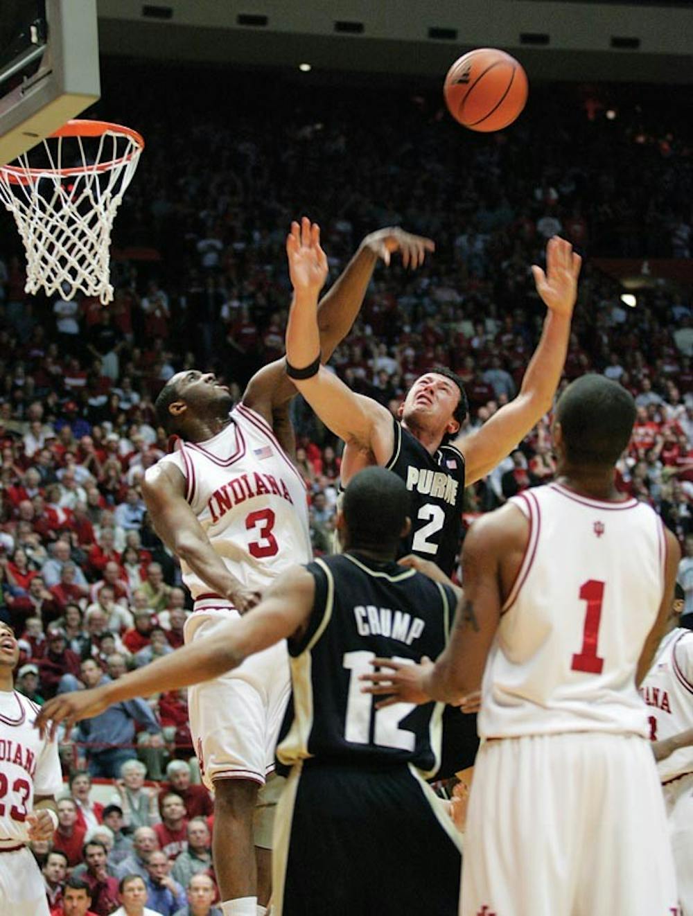 IDS FILE PHOTOIU senior forward D.J. White blocks Purdue's Nemanja Calasan Feb. 19 at Assembly Hall. 