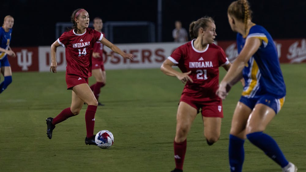 Sophomore midfielder Olivia Smith dribbles through defenders against Morehead State, Aug. 24, 2023 at Bill Armstrong Stadium. Indiana has already surpassed its 2022 win total in the 2023 season.
