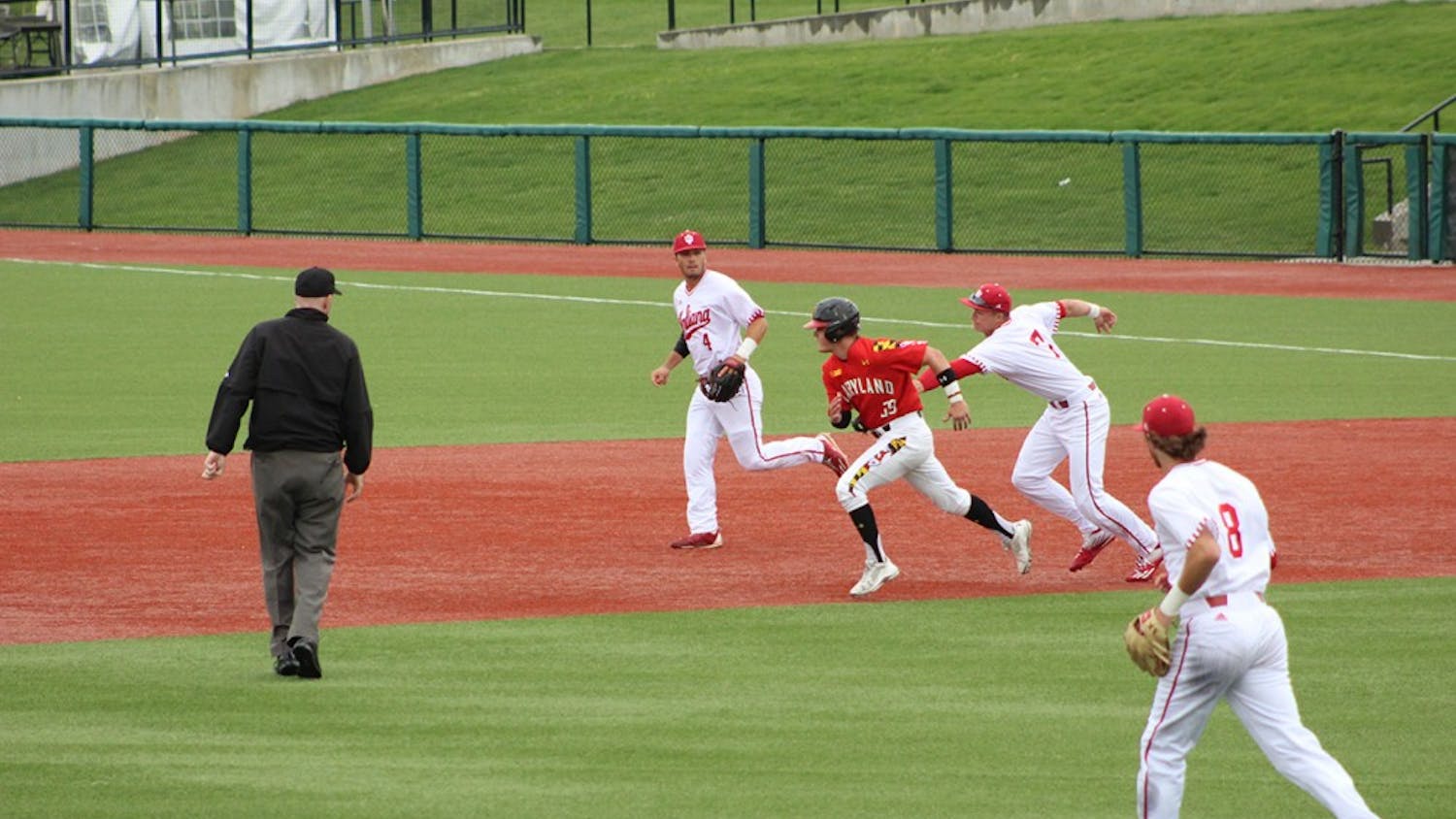 First baseman Matt Gorski tags out a Maryland baserunner in the top of the second after he got caught in a pickle. This was the first game of the series between the Hoosiers and the Terrapins.
