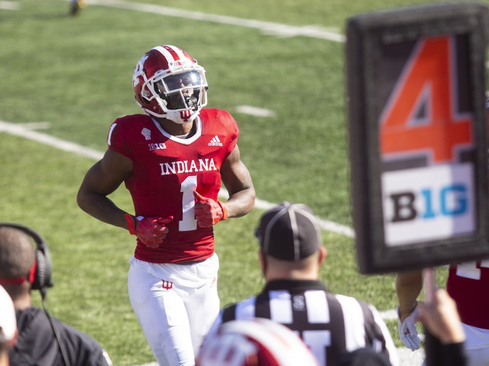 IU wide receiver Whop Philyor jogs to the sidelines Nov. 7, 2020, at Memorial Stadium. Philyor and senior Jamar Johnson have officially declared for the 2021 NFL draft.