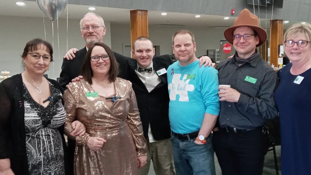 Members of the Autism Rocks and Rolls team and board of directors. From left to right: Angel Sherer, treasurer, Gina Mitchell, president, Joe Pursell, board member (behind Gina), Sam Mitchell, creator, Steve Jascewsky, co-president, Ryan Bruce, vice president, Keli Gray, secretary.