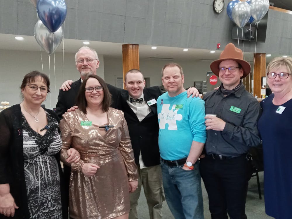 Members of the Autism Rocks and Rolls team and board of directors. From left to right: Angel Sherer, treasurer, Gina Mitchell, president, Joe Pursell, board member (behind Gina), Sam Mitchell, creator, Steve Jascewsky, co-president, Ryan Bruce, vice president, Keli Gray, secretary.