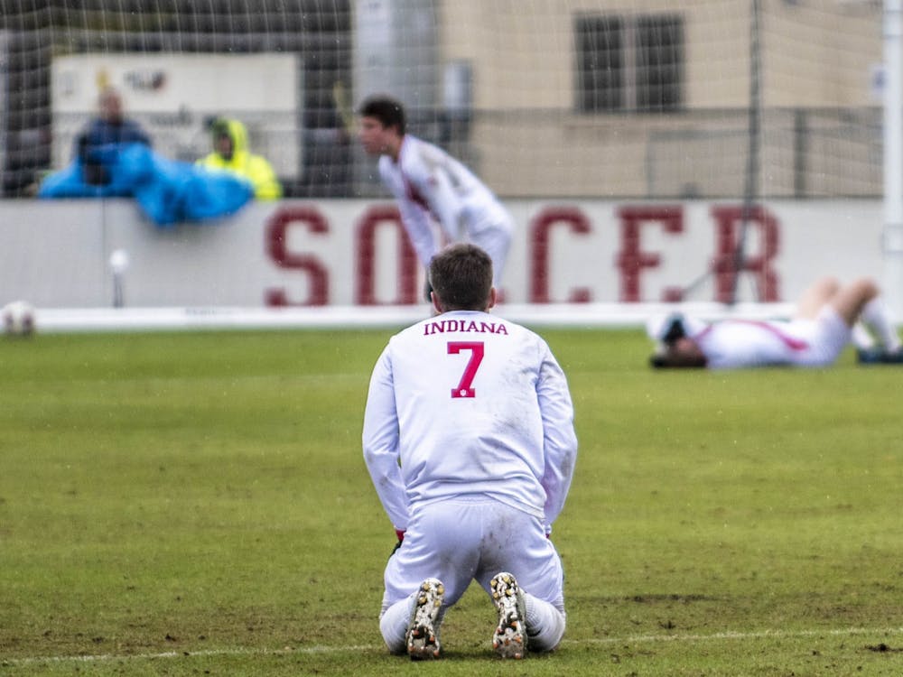 Then-freshman Victor Bezerra rests on his knees after IU was eliminated from the NCAA Tournament by the University of California, Santa Barbara on Dec. 1, 2019 at Bill Armstrong Stadium. Bezerra was named a Missouri Athletic Club Hermann Trophy finalist Wednesday.