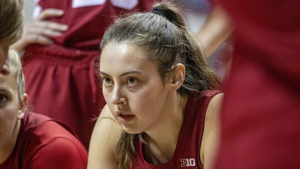 Indiana junior forward Mackenzie Holmes listens to head coach Teri Moren during an exhibition game against the University of Indianapolis on Nov. 5, 2021, at Simon Skjodt Assembly Hall. Holmes scored 17 points and pulled down a career-high 19 rebounds against Western Michigan University on Sunday in Bloomington.