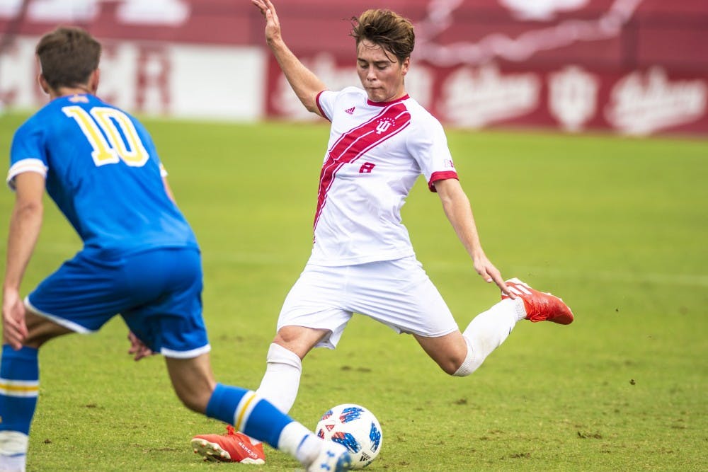 <p>Freshman Aidan Morris plays a long ball during IU’s 2-1 win over the University of California, Los Angeles on Sept. 2 at Bill Armstrong Stadium.</p>