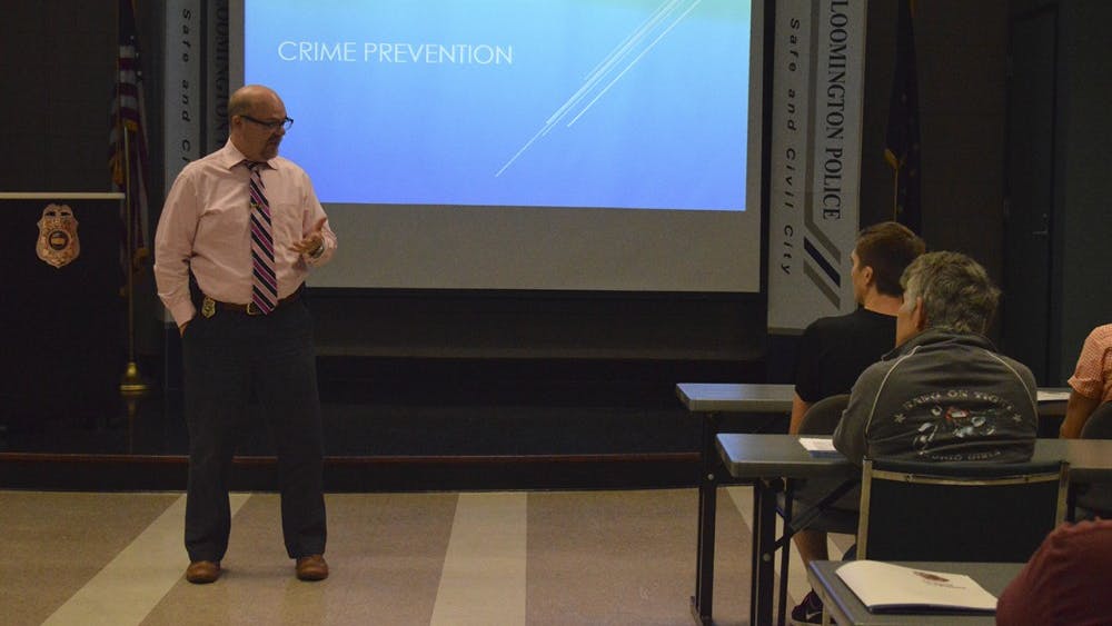 Captin Steve Kellams speaks at the Bloomington Police Department's Citizens Academy Tuesday afternoon. Topics disscussed during this session were about crime prevention and hostage negotiation. 