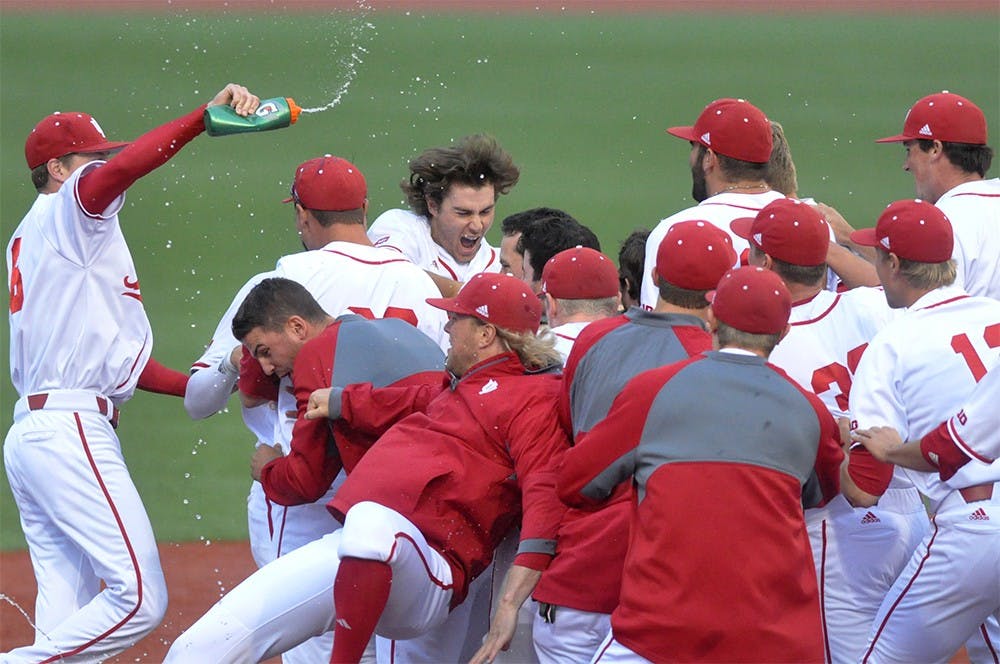 The Hoosiers celebrate Sophomore Laren Eustace's walk-off single which gave them a 3-2 win over Kentucky.